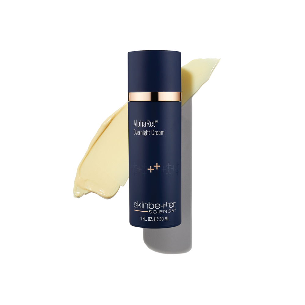 Blue bottle of Skin Better AlphaRet Overnight Cream with cream swatch behind it