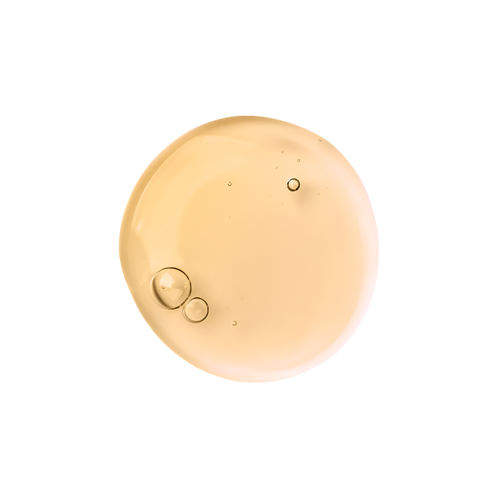Gold-colored sphere of a cleanser swatch with small bubbles