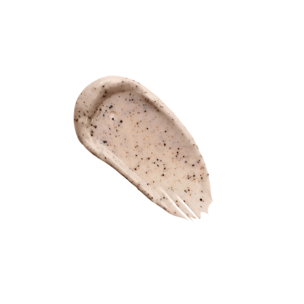 Beige cream swatch with specks showing an exfoliant texture