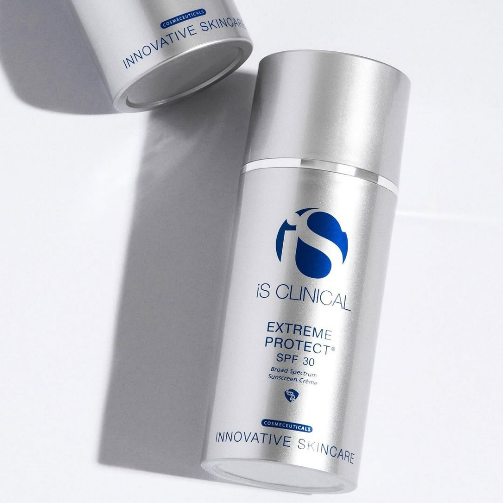 IS Clinical Extreme Protect SPF 30 skincare product in a silver container on a white background