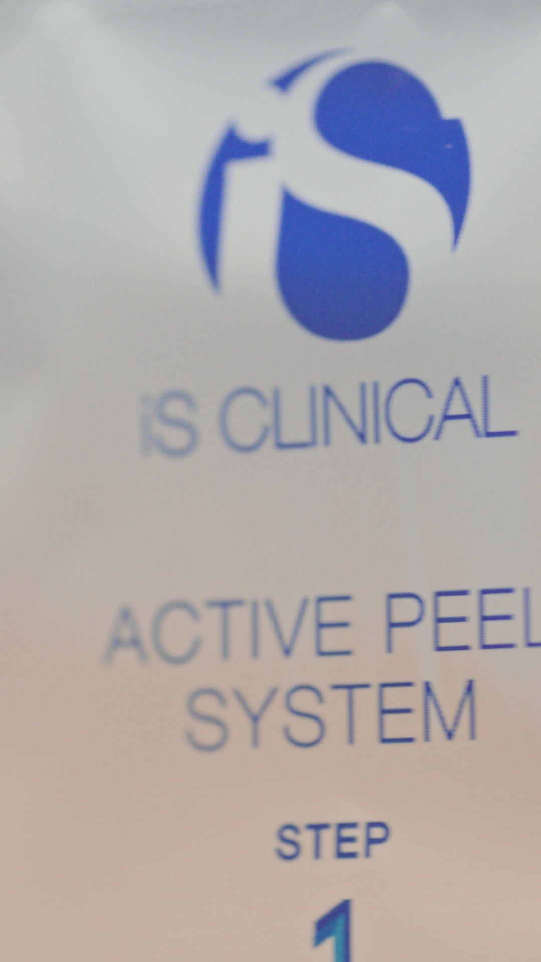 Video of iS Clinical Active Peel System being applied to the face by a model