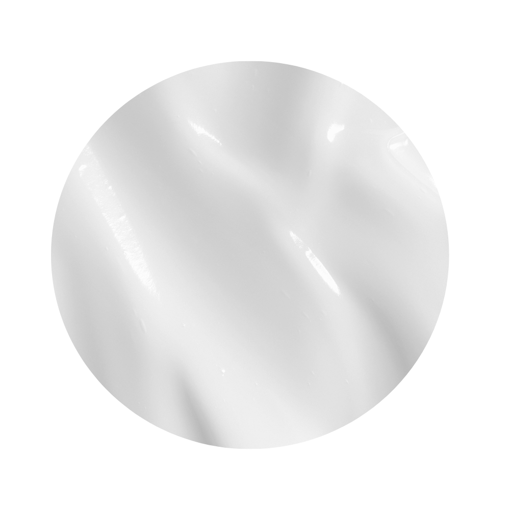 Up close white cream texture of Glo Skin Beauty Oil Free Moisturizer