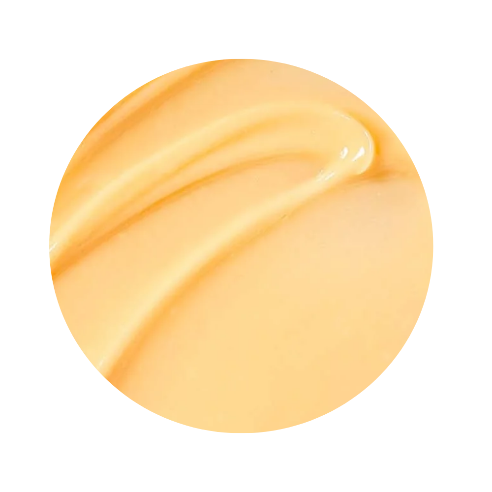 Close up light yellow-orange texture of Skin Better EyeMax AlphaRet Overnight Cream