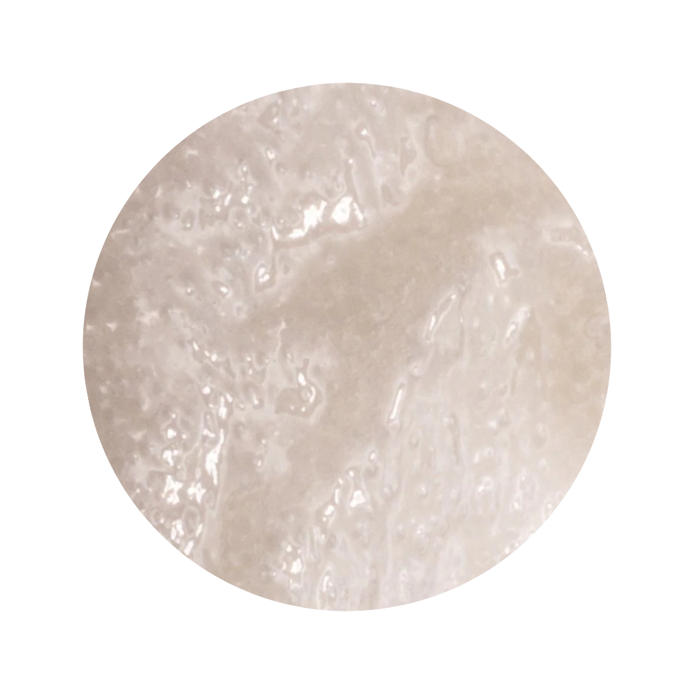 Up close beige texture of iS Clinical Cleansing Complex Polish