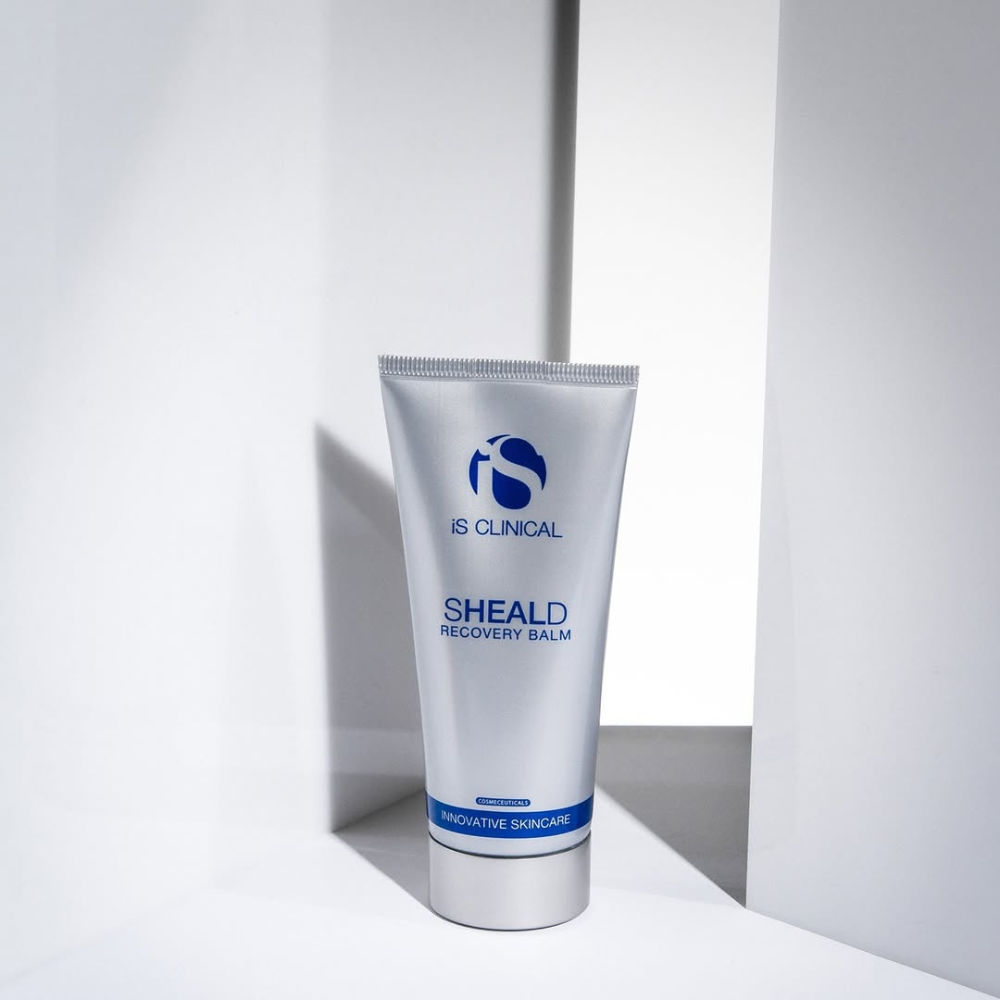 Tube of silver iS Clinical Sheald Recovery Balm on a white background