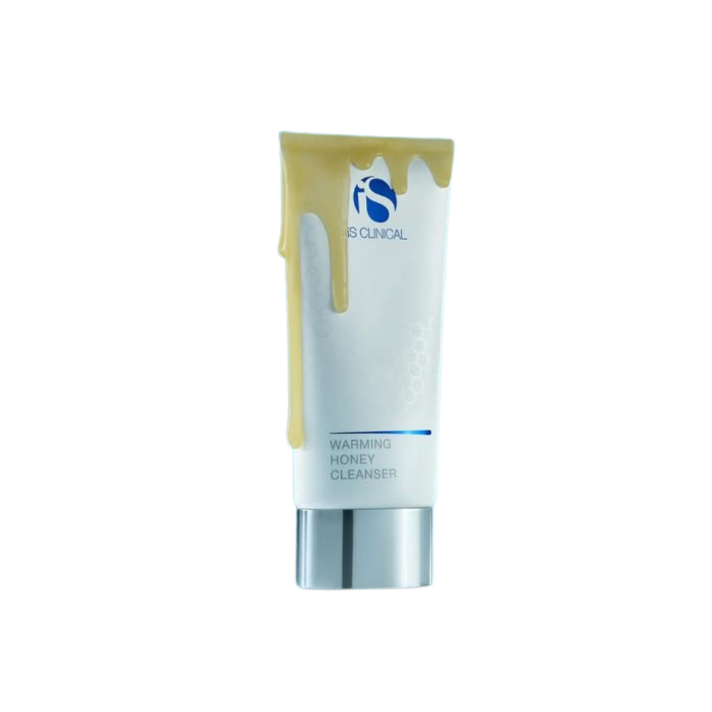 White skincare tube labeled iS Clinical Warming Honey Cleanser