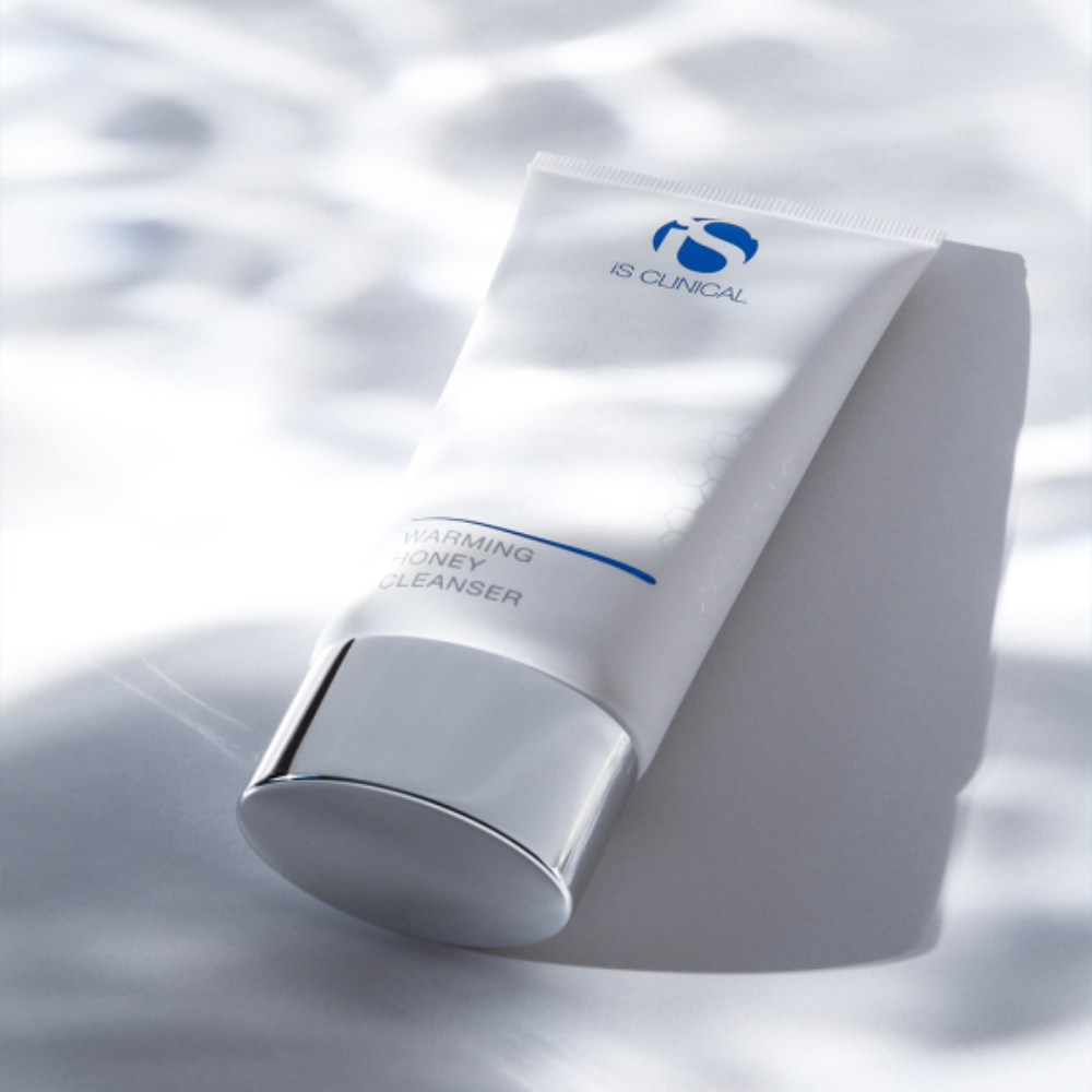 White tube of iS Clinical Warming Honey Cleanser