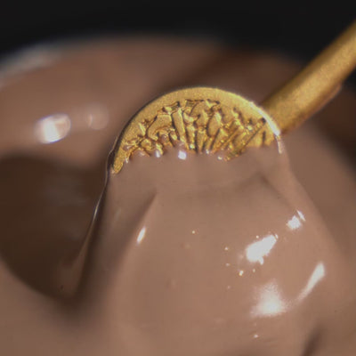 Video of May Lindstrom The Honey Mud texture being mixed with a spoon